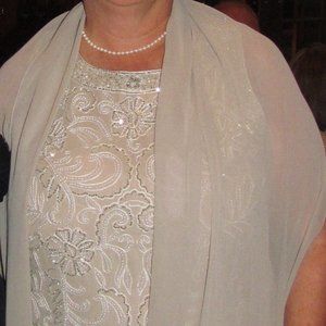 Full length beige dress with beaded top